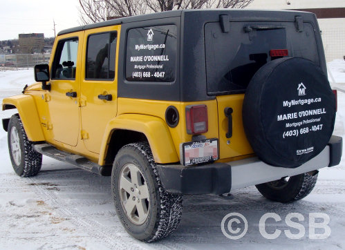 Car decals placed on side windows and spare cover
